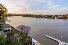 4/88 Macquarie Street St Lucia Qld 4067 Please call Jason Adcock to register for private inspections Saturday's and Wednesday's.
With just one apartment per floor, St Lucia's Waterford complex offers
an indulgent rarity - expansive full level living across some 348m2 with
panoramic river views, premier pontoon and pool facilities and a
picturesque position in a truly superlative locale.
Built far out into the riparian, each apartment has been designed to
maximise the views with a sprawling terrace projecting out
significantly, directly towards the water. Not only does this bring a
rare level of privacy but also an uninterrupted 180 degree panorama that
encompasses two wide stretches of the river, parkland, Toowong and the
CBD. Additionally, being on the fourth floor, this particular apartment
enjoys an almost perfect elevation - high enough to elicit far-reaching
views but close enough ensure a strong connection with all the goings on
of the river.