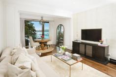 4/585 New South Head Road Rose Bay NSW 2029 Property Description Harbourfront Glamour With Panoramic Views, House-Like Proportions & Bespoke Inte A fresh vision of urban glamour with a chic New York inspired design aesthetic, this custom recreated harbourfront apartment is set against a mesmerising harbour backdrop with panoramic northerly views over Rose Bay Marina. With nods to Hollywood and its Art Deco heritage, it has been meticulously recreated showcasing exceptional detail throughout from the state-of-the-art kitchen and luxurious marble bathrooms to the bespoke joinery and timber-panelled walls. Facing north and opening through double glazed glass to a view-swept terrace, it features a semi-like layout with more than 130sqm of in/outdoor living space. Mid floor setting in a revamped Art Deco block of 8 Exclusive harbourside setting overlooking Rose Bay Marina Fluid open living and dining, Kelly Wearstler wallpaper Custom entertainer’s island kitchen, fully integrated Wraparound terrace with never-to-be-built-out views 3 double beds with built-ins, luxurious master suite 2 luxurious baths featuring Calcutta & Carrara marble finishes Internal laundry, integrated sound, ducted reverse air Walnut polished timber floors, terrazzo foyer, lift access