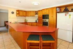 22 Kauri Court Bonogin QLD 4213 LARGE FAMILY HOME - ENTERTAINERS DREAM Set on an almost fully fenced and elevated 3000m2 block, this immaculately presented 4 bedroom plus study home will meet the requirements of a large family who require space with both house and land. Features include: * Air conditioned main bedroom with ensuite and large wardrobes * Separate formal and informal living and dining areas * Spacious kitchen with outlook to rear of property * Woodburner * Huge laundry * Massive outdoor covered deck * Inground pool with pool safety certification * Side access on both sides of house * Elevated with wide hinterland views * Plenty of room for a shed * Landscaped gardens Simply move in and put your feet up as all the hard work has been done including new carpets and interior paint throughout. Book your inspection today. View Sold Properties for this Location View Auction Results General Features Property Type: House Bedrooms: 4 Bathrooms: 3 Land Size: 3000 m² (approx) Outdoor Features Garage Spaces: 2 Swimming Pool - Inground Offers above $675,000