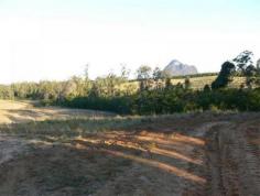 123 Veritz Rd Peachester QLD 4519 Ideally located on the Sunshine Coast hinterland is an impressive 62.67
acres of mostly cleared and undulating fertile land with fantastic views
of the Glass House Mountains. This would be a beautiful place to build
offering privacy and seclusion. There are approximately 4500 741
variety macadamia's planted (3 year growth) - so great potential for a
future income. There is a creek with permanent water and the property
is situated in a high rainfall area. This land is positioned less than
10mins to all amenities in the high growth railway town of Beerwah. You
would also be only approx. 1/2 hour to Sunshine Coast beaches and 1
hour to Brisbane CBD and airport. Secure your opportunity to invest in
the future growth of both your land and this sought after area.
REF # 5494