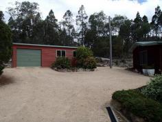 66 Dalcouth Road Stanthorpe Qld 4380 3 BEDROOM, 2 BATHROOM HOME ON JUST UNDER AN ACRE
Bordered by lovely gardens and lawns is this charming 3 bedroom
western red cedar home, less than 5 mins from town on just under an
acre. Featuring an open plan living design with the lovely pine kitchen
overlooking the lounge and dining areas, this home also boasts three
built-in bedrooms, WIR off the master, two bathrooms, a well positioned
enclosed sunroom and a large front verandah overlooking the gardens and
pond. Also boasting wood heating plus reverse cycle air conditioning, a
6m x 9m single remote lock-up garage with plenty of storage/workshop
space, 9,400 gallons of rainwater and a covered barbeque area, this
property represents true value for money and an inspection is highly
recommended. Contact Scott Mann on 0427 814 444 or Simon Leigh on 0418
790 070 to arrange an inspection.