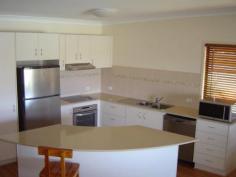 57 First Avenue, WOODGATE QLD 4660 $599,000 FULLY FURNISHED EXECUTIVE CLASS RESIDENCE approx 100 metres from the beach at DESIRABLE WOODGATE BEACH. The FULLY FURNISHED property is situated in First Avenue, with an adjacent walkway providing quick beach access - feet in the water in about two minutes. The residence is the northern of the two units, and captures cooling sea breezes in summer and plenty of winter sunshine on the north-east facing top deck. The Woodgate Beach Hotel with restaurant is about a five minute leisurely stroll as is the direct to ocean boatramp. Theodolite Creek, the mighty Burrum River, and the National Parkland boardwalk and hiking tracks are all just a few minutes drive away. The FURNISHED unit would well suit owner occupier,or alternatively, be an excellent letting property for holiday makers. The rear yard is fenced. THE RESIDENCE FEATURES:- Ground Level
