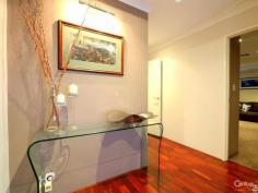 79 The Promenade Wattle Grove WA 6107 Wattle Grove Masterpiece Inspection Times: Sun 09/11/2014 02:00 PM to 02:30 PM As soon as you step into this beautifully presented property you will be impressed by the size and space this 4x2 family home has to offer. High ceilings throughout add to the sense of space in this home as you step through the double front doors into the large foyer. You will be blown away by the sheer size of the master bedroom and en-suite bathroom with double vanities, twin shower heads, separate toilet and his and hers walk-in robes. Walking into the main living area again you will be wowed by the beautiful solid timber floors which are throughout the home and by the size of the open plan living/dining and beautifully appointed kitchen with stainless steel appliances, glass splash backs, corian bench tops and an abundance of cupboard space which is complimented by a huge walk-in pantry. A large theatre room with twin entries awaits off the foyer and living areas and is perfect for a family movie night. The remaining three queen size bedrooms all have built-in-robes with the laundry also having a large walk-in linen cupboard and plenty of cupboard space. The open plan living area opens out onto a large timber deck area with built-in cupboard and sink perfect for outside dining. The deck is wired for sound and there is a large powered shed again with a sink. There is also side access with enough room for a caravan or boat. Close to transport, shops and within walking distance to the local primary school you can simply move in and start living as everything in this home has been carefully thought out for easy family living.