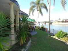 52 Walter Raleigh Cr Hollywell QLD 4216 HUGE PRICE REDUCTION - MUST SELL NOW! Owners relocating and price drastically reduced by $100,000 for immediate sale. Bright & airy 4 bedroom, 4 bathroom waterfront family home on 848m2 block located in a quiet cul-de-sac offering 34 meters wide water frontage and only a short cruise by boat to the Broadwater and seaway. Many features including:- * Open plan living areas with amazing wide water views * Floor to ceiling butt-glass windows and 10ft high ceilings * Four bedrooms with waterfront king-size master suite * Master suite with his & hers ensuite and private robes * Four bathrooms including an entertaining area bathroom * New main bathroom with double vanity, spa bath and shower * New kitchen with Caesar stone tops & quality appliances * Soft close drawers, dishwasher and space for large fridge * Ducted air-conditioning and remote ceiling fans throughout * Separate entertaining area with private saltwater pool * Wet bar with stone bench top on the waterfront * Waterfront entertaining area with lawn * 9m pontoon with concrete pylons, power & water * Double garage plus room for 2 extra cars * Workshop/storage room and large attic . General Features Property Type: House Bedrooms: 4 Bathrooms: 4 Land Size: 848 m² (approx) Indoor Features Ensuite: 1 Study Outdoor Features Carport Spaces: 2 Garage Spaces: 2 $975,000