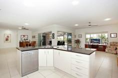 19 to 21 Hirst Court Ningi QLD 4511 GREAT HOUSE – EXCELLENT LOCATION Just 4 years old, this ‘as new’ house sits perfectly in a quiet cul-de-sac on a tropically landscaped 3,003 m2 block. The house is 291.61 sqm with another 56.5 sqm under roof screened entertainment area, giving a total living area of 348.11 sqm. With colourbond roof and light coloured brickwork, the house is ideally suited to the Queensland climate. The house is modern open-plan living featuring 9 foot ceilings throughout. More than luxurious and comfortable, this home also ticks all the boxes for energy efficiency: • All walls are fully insulated with RI.5 batts and the roof area with R3.0 batts. • 24 month old 1.52KW solar power system, with a fully transferable warranty. • Hot water is generated via the very energy efficient heat pump system • Tinted windows to reduce heat and glare • Energy efficient lighting and ceiling fans Other features include: • Fully screened outdoor entertainment area, which is cooled by a centrally located ceiling fan • Four large carpeted bedrooms • Master bedroom features an enormous walk in wardrobe / dressing room and ensuite with large shower and double vanity. General Features Property Type: House Bedrooms: 4 Bathrooms: 2 Land Size: 3003 m² (approx) Price per m²: $213 Indoor Features Built-in Wardrobes Dishwasher Split-system Air Conditioning Outdoor Features Remote Garage Carport Spaces: 4 Garage Spaces: 4 Outdoor Entertaining Area Shed Eco Friendly Features Solar Panels Water Tank $639,000
