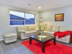 9 Grandiflora Grove Point Cook VIC 3030 Porter Davis stunner in enviable AlamandaSet among established properties in one of Alamanda's best streets, this striking five year-old (approx.) Porter Davis home offers quality and a stylish mix of formal and informal living spaces. Constructed with low maintenance living inside, the floorplan incorporates four good size bedrooms, three separate living zones and two entertaining areas outdoors. - Four bedrooms, including the main with walk in wardrobe and en suite with stylish twin vanity and oversized shower. Bedrooms two, three and four are tucked away down a hallway; all with built in robes. - Contemporary kitchen with striking red glass splashback, stone benchtops, 900mm stainless steel appliances, dishwasher and ample storage. - Living areas are offered in abundance, including the formal lounge, meals/family area adjacent the kitchen and separate rumpus room. - Outdoor entertaining is a breeze with two decked areas, including an alfresco area and separate sun-drenched deck accessed via glass sliding doors. - 28 squares of living including garage (approx.) set on 515m2 block (approx.) - Complete with luxury features including ducted heating, evaporative cooling, double garage with remote-controlled door and walk-through access to the backyard, fibre optic internet, water tank plumbed to toilets, high ceilings, alarm system, front and rear landscaped gardens, quality floor coverings and window furnishings, and more. Located about 22 km from Melbourne's CBD in the Alamanda Estate (2010 UDIA National Residential Development) which includes a $6 million fully built and operational recreation and community centre, café, five hectares of wetlands, landscaped parks, stunning sculptures, walking and cycling tracks, child care facility and Alamanda State College.