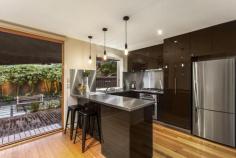189 Dover Street Richmond VIC 3121 Style, Space and Inner-City Convenience A space maximising layout bathed in ambient light, independent garden frontage and perfect proximity to a host of lifestyle attractions lends significant allure to this style-savvy two-storey town residence boasting larger than anticipated living expanses and impressive alfresco entertaining. Situated in a wide cul-de-sac within popular Cremorne precinct, free-flowing interiors include west-facing living room with golden hardwood floors, recently renovated kitchen (Blanco dishwasher and stainless steel benchtops), and adjoining casual dining with retractable bifolds opening to inviting outdoor decking and private paved courtyard. Comfort is further enhanced by two bedrooms with robes, third bedroom or ideal study, renovated bathroom and laundry, gas heating, evaporative cooling (upstairs) and off-street parking for at least one vehicle. Stroll to Richmond Railway Station, Punt Road buses and city trams, Swan Street shops and cafes, Gosch's Paddock, MCG, Rod Laver Arena, AAMI Park, Botanical Gardens, and Yarra banks. View Sold Properties for this Location View Auction Results General Features Property Type: Townhouse Bedrooms: 3 Bathrooms: 1 Indoor Features Floorboards Built-in Wardrobes Dishwasher Gas Heating Evaporative Cooling Outdoor Features Carport Spaces: 1 Deck Courtyard Contact Agent
