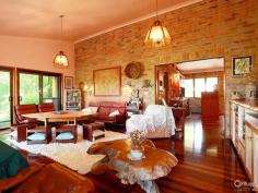 Uki, NSW 2484 3 Homes in one set on 6 Acres! Exclusive hilltop residence overlooking Mt Warning set on 6 private acres * 4 bedrooms, main bedroom including ensuite with a spa, a private study and a library area * 3 outdoor entertaining areas with private courtyard and 2 open veranda sitting areas * Self-contained unit with separate power source which consists of its own bedroom, lounge room, kitchen, bathroom & laundry * Kids wing has own bathroom and lounge area that can be closed off from the rest of the house * Main wing of home includes a chefs kitchen with stainless steel bench tops, has large dining and lounge rooms * Set on 23,860m2 this lot is just under 6 acres and has plenty of room for storing a caravan or boat * 2 x 10,000 gallon water tanks giving 75,708Lts of water, with a dam also located on the property * Property has separate garage with studio and workshop with 3 phase power to studio and house All Inspections are by Appointment Only!
