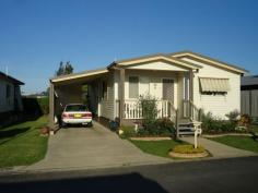 56 Bangalow Crescent Gateway Village,Grafton NSW 2460 A delightful 2-bedroom residence presented in immaculate order and superbly located within the park. Features include: a large living room; dining area off the kitchen; oodles of bench and cupboard space with the kitchen; both bedrooms are well sized and have built-in robes; a big bathroom with a handy over-sized shower recess; front and back verandahs; nice yard space. Extras include air-conditioning and ceiling fans. The back verandah takes a north east aspect - plenty of lovely summer breezes enjoyed here. Servicing the residence is a large carport with lock-up storage room. The Gateway Village is a top quality managed residential park. Manicured grounds and gardens create a beautiful living environment for the residents. The park's website is - www.thegatewayvillage.com.au