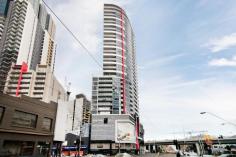 1405/109 Clarendon Street SOUTHBANK Vic 3006 $379,000 Prominently situated win the landmark '109 Clarendon' building, this sensational, high-rise apartment effortlessly delivers style and easy living in the ultimate of Southbank locations. The apartment, designed spaciously over 46 squares), offers a naturally-illuminated living and dining domain enhanced spectacularly with floor-to-ceiling windows, and sliding door to the balcony providing a sublime space to dine alfresco as you take in the far-reaching views over Port Melbourne to Hobson's Bay. The spacious bedroom, also enjoying superior views via full-height expansive and curved windows, and a wall of mirrored robes, is more than adequately serviced by the chic bathroom with a European laundry, and a stylish kitchenette, superbly appointed with sleek stone surfaces, large fridge space, plentiful cabinetry and stainless-steel appliances (gas cooktop, range hood electric oven and dishwasher).