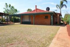 30 Nemesis Pl South Kalgoorlie WA 6430 Love the outdoors? Dont miss out on viewing this fantastic family home with lovely sweeping verandas and beautiful established lawns and gardens. This freshly painted, modern family home features 4 double sized bedrooms, 1 large family bathroom with separate bath and shower, new vanity and storage cupboard. The open plan living, dining and kitchen is bright with large windows overlooking the beautiful veranda and gardens. The kitchen is bright and functional with gas oven, pantry, double sink and breakfast bar. The open plan area also offers a tile fire for the eventual cold winter nights and for the hot days around the corner ducted air-conditioning to all living and bedrooms. The outdoors ticks all the boxes with a good sized grassed area and huge sandpit for the kids to play, an external games room with patio for the adults and a large 6m x 6m powered shed for the tools and toys this property has it all. Located close to Primary and Secondary Schools, local IGA and Oasis don't miss out on the opportunity to own this lovely home. Contact Tom today on 0418 952 548
