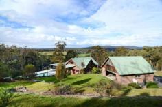 1657 Nethercote Road South Pambula NSW 2549 River Of Dreams Been looking for something special to call home? Take a look at over 14 acres with incredible Yowaka River and hinterland views, an open plan 4 bedroom home with high ceilings, total privacy, solar heated concrete pool and less than 5km on sealed road to Pambula and 8km to the beach! The home utilises natural timbers, has wide under roof verandahs with stunning views down to the river, quality fixtures and fittings that include double glazed windows. The 3 downstairs bedrooms have built-in robes while the upstairs area is a bedroom and living area in one with ensuite, walk through robe and own balcony! The solid timber kitchen includes stainless steel splash back, gas top with electric oven, twin draw dishwasher and breakfast bar that adjoins the living area looking onto the surreal landscaped pool area with lush lawns and natural beauty all around. A huge brick 4 car garage provides secure parking and storage while a separate colorbond shed and self contained 1 bedroom cabin complete with own kitchen and bathroom brings endless possibilities to this unique property. Mains power, both a wood fire and reverse cycle air con, over 90,000 litres of tank water ... show more View Sold Properties for this Location View Auction Results General Features Property Type: Acreage/Semi-Rural Bedrooms: 4 Bathrooms: 2 Land Size: 5.81ha (14.34 acres) (approx) Price per acre: $47,071 Indoor Features Air Conditioning Open Fireplace Outdoor Features Garage Spaces: 6 Other Features Balcony, Terrace/paved, Outdoor entertainment area, Fenced, Granny flat, Low maintenance $675,000