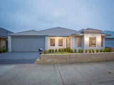 39 Runnymede Gate Wellard WA 6170 A TOUCH OF CLASS! Need 4 bedrooms for a growing family? This new to the market beautifully located home has 4 double bedrooms, all with Robes PLUS a Study/Activity Room! This large family home exudes a quiet elegance that starts at the glass featured front door and continues right through the home. The neutrally tiled flooring also starts at the front door, carries through to the open plan living areas and all traffic areas. In fact, the whole house is decorated in quiet, neutral tones that allow you to add your colour and style. There is a separate Lounge or Quiet room to the left of the wide inviting entrance hall with the Master Bedroom to the right. Plenty of room here for your King Sized bedroom suite, also a spacious Ensuite Bathroom with a separate WC. Lots of Open Plan Living overlooked by a well equipped Galley Style Kitchen with Stainless Steel gas cook top, rangehood, oven and double sink. Kitchen also boasts lots of cupboards, overheads and a walk in pantry. Ducted Reverse Cycle Air Conditioning ensures comfortable living all year round. The feeling in this quality constructed home is Spacious, Light, Bright, Airy and Classy! On a 509sqm block with a smart bordered lawn, double driveway to double remote controlled automatic door at the front of the home and a shrub bordered lawned area at the back, overlooked by an Alfresco Entertaining area, there is plenty of room for both the kids and the adults to play!! Public Transport to the door, a short walk to the Wellard Train Station, the new Shopping Precinct and Peter Carnley make this a very attractive proposition. A Terrific Location!! Take a long look at this property - it is a lot of house with a lot of benefits. There are times when only the best will do - Buying a home is one of these!!