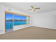 2/11a Oyama Avenue Manly NSW 2095 HARBOURFRONT PARADISE To live on the foreshores of Sydney Harbour, looking across a view-swept swimming pool and beautifully manicured harbourfront lawn, must be the ultimate dream. Just a short stroll from Manly's ferry terminal, at the end of a quiet seaside cul-de-sac, this spacious 2 bedroom Waterfront apartment presents a wonderful Lifestyle opportunity. Part of a small boutique building, with secure garaging and sandy beaches just footsteps away, this property enjoys breathtaking main harbour views to Forty Baskets Beach and beyond. The sunny aspect and prime front-row position enjoy a never-ending parade of yachts and pleasure-craft where you'll really have to pinch yourself to believe it's all yours... Seeing is believing ! *** BE SURE TO VIEW OUR AMAZING 2min VIDEO TOUR ONLINE AT maxwalls.com/id178