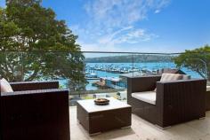 4/585 New South Head Road Rose Bay NSW 2029 Property Description Harbourfront Glamour With Panoramic Views, House-Like Proportions & Bespoke Inte A fresh vision of urban glamour with a chic New York inspired design aesthetic, this custom recreated harbourfront apartment is set against a mesmerising harbour backdrop with panoramic northerly views over Rose Bay Marina. With nods to Hollywood and its Art Deco heritage, it has been meticulously recreated showcasing exceptional detail throughout from the state-of-the-art kitchen and luxurious marble bathrooms to the bespoke joinery and timber-panelled walls. Facing north and opening through double glazed glass to a view-swept terrace, it features a semi-like layout with more than 130sqm of in/outdoor living space. Mid floor setting in a revamped Art Deco block of 8 Exclusive harbourside setting overlooking Rose Bay Marina Fluid open living and dining, Kelly Wearstler wallpaper Custom entertainer’s island kitchen, fully integrated Wraparound terrace with never-to-be-built-out views 3 double beds with built-ins, luxurious master suite 2 luxurious baths featuring Calcutta & Carrara marble finishes Internal laundry, integrated sound, ducted reverse air Walnut polished timber floors, terrazzo foyer, lift access