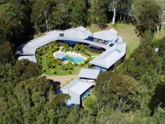 432 Lake Cooroibah Rd Cooroibah QLD 4565 This 2.17 ha site is the setting for this magnificent 8-bedroom home,
now too large for it's empty nester owners who wish to downsize.
There is potential for use as a corporate resort, dual home, couples retreat or a B&B.
The home is surrounded by approx. 1/4 km covered decking which offers 5
alfresco entertainment areas including a large central breezeway.
Features Include:
506m2 under the roof and 400m2 of covered verandahs
High Cathedral ceilings, double sliding doors throughout
Large sitting room with dining area, second area as bar.
Master suite privately on first floor with dressing room and ensuite
Second Master suite plus six further bedrooms, 6 bathrooms
Large working office with access to verandah
Generous outbuildings, capacity for 11 cars, workshop
Large resort style pool with waterfall and gazebo
Dam, solar hot water, 3 phase mains electricity.
Noosa 12 minutes drive from shops,beaches, schools.