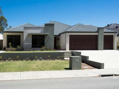 114 Roxburghe Dr The Vines WA 6069 RELAXED LIVING WITH SUPERB GOLF COURSE VIEWS! Your only local Real Estate Office, The Vines Real Estate offers the following quality home in a great location For Sale. Perfectly configured for relaxed living and outdoor entertaining, this beautifully presented 4 bedroom 2 bathroom home with outlook to golf course and opposite bush reserve has low maintenance gardens and sparkling below ground pool. Sit back, relax and enjoy the peaceful surrounds! Decked portico with solid wood double doors Stunning entrance with spot lighting High 31c ceilings in entrance and living areas Marri wood flooring throughout Open plan kitchen/meals/family Versatile study room with frosted glass doors Theatre room with recessed ceilings and mood lighting Chefs kitchen with central stone bench, quality appliances and plenty of storage North facing large master bedroom with walk in robe Resort style ensuite with shower, double vanity, feature tiling and separate toilet 3 further Queensize bedrooms with built in robes Main bathroom with shower and bath Separate guest powder room Large 32.5sqm decked alfresco under main roof with inbuilt kitchen and barbecue Sparkling 9mx4m below ground pool with water feature, decking and glass fence surround Reverse cycle ducted air conditioning, alarm system, solar hot water system, smart wiring, 3 phase power, reticulated front garden and lawn 3 car remote garage and exposed aggregate driveway Living area of 243sqm and 337sqm under main roof Land area of 711sqm