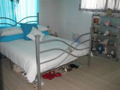 156 MACALISTER STREET Murgon QLD 4605 RENTAL BUSTER - INVESTMENT PLUS 3 bedrooms all built in, modern kitche, large backyard fully fenced, garden shed, carport, PRESENTLY RENTED FOR $200 P.W. WITH LONG TERM TENANT General Features Property Type: House Bedrooms: 3 Bathrooms: 1 Building Size: 138.98 m² (15 squares) approx Land Size: 900 m² (approx) Price per m²: $167 Indoor Features Toilets: 1 Built-in Wardrobes Outdoor Features Carport Spaces: 1 Fully Fenced Eco Friendly Features Water Tank Other Features SUSTAINABILITY DECLARATION AVAILABLE $150,000