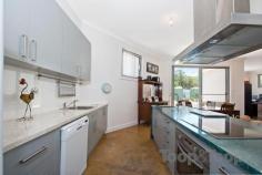 11 Sawtell St Largs Bay SA 5016 For Sale $595,000 - $615,000 This well presented home has been renovated and extended and offers character filled living with all the modern conveniences you'd expect. Boasting character features such as polished floor boards, high decorative ceilings, fireplaces and decorative timber architraves. All windows have been replaced with double glazed aluminium windows inserted into the decorative timber frames. Offering a formal lounge with fireplace and a massive open plan family room with a study home office area, all with polished concrete flooring. The large well equipped kitchen is open plan to the family room and includes large island bench, two separate kitchen sinks, large corner pantry, dishwasher, induction cooktop and loads of bench space.