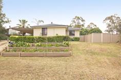Kearns NSW, 2558 Perfect First Home Or Investment. Looking for that perfect family home or investment which is situated on one of kearn's most popular streets, then don't miss this golden opportunity. Offering four generous size bedrooms, built-ins and ceiling fans to all, optional 5th bedroom or study, good size lounge, air conditioning, combustion fire place, combined dinning and modern kitchen with dishwasher. Other features include renovated bathroom, spa bath, 2 toilets, alarm and new Venetian blinds. Outside is perfect for entertaining with pergola and BBQ area, big backyard with side access for the tradesman and double tandem carport. Close to transport and short stroll to shops and schools. Current tenants paying $450 Per week and would love to stay!