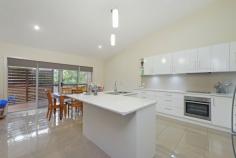 1/25 Kingfisher Road Port Macquarie NSW 2444 For Sale - $389,000 bed 3 bath 2 car 2 Property ID: 1P1487 Property Type: Villa Garage: 2 Construction: Brick veneer Outgoings Council Rates: $2600 Yearly Features: Built-In Wardrobes Close to Transport Close to Shops Close to Schools Ensuite STUNNING DESIGN WITH A BUSHLAND BACKDROP At Kingfisher Drive you will find this beautifully finished three bedroom villa in a complex of only 2 that cleverly combines modern architectural design elements with functionality. The property features a modern facade with timber features set against the hues of a contemporary Australian coastal design. Stepping inside, you are immediately impressed by the quality of the villa's inclusions and also the unique design features that create a sense of light and space. High gloss floor tiles feature throughout with a stunning open plan living area opening out on to a timber deck. Here you can fully appreciate the architectural elements that make this villa special, with soaring skillion rooflines and design features that fill every room with natural light. There is a separate dining-family area that seamlessly integrates with the contemporary kitchen. The kitchen features beautiful stone benchtops, an L-shaped island bench, electric cooktop, high raked ceilings and beautiful pendant lighting. There are three queen sized bedrooms with the master featuring a flawlessly finished open plan ensuite with cantilevered vanity, corner shower, generously sized built-in robes and a feature void that fills the room with natural light. The same quality extends to the main bathroom which comes complete with sizeable linen storage. There is a rear deck leading down to a low maintenance grassed area. This property is just minutes from town, shops and schools and the new University is just so close. Live in or invest, currently returning $395pw to an excellent tenant who would love to stay on. Council Rates $2,600pa Strata is newly registered (shared costs of insurance only)