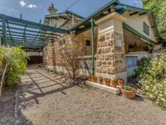 77 Fisher St Fullarton SA 5063 $695,000 - $725,000 Sit on the wonderful wide front verandah & watch the children play in the completely private front garden, exquisite character features, 4 bedrooms, 2 modern bathrooms, polished jarrah & Baltic floors, sitting room with open fire, formal dining room with box bay window, neat kitchen overlooks the family room, double carport with automatic door - Ornate lofty ceilings - Reverse cycle air conditioner – split system - Gas heater - Large gas stove ‘la Germania’ - Pantry - Leadlight - Open fireplaces Secluded behind a high hedge & walking distance to good schools, shopping & transport, this home represents great value to get into the area.