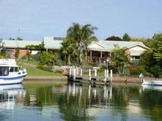 2/55 Wellington Street Paynesville VIC 3880 STUNNING HOME ON THE CANALSHere is a fantastic opportunity to buy a top quality home on the canals in a close-in locale with a jetty berth. Views of the canals from most rooms, Jarrah kitchen with timber bench tops, electric cooking, dishwasher, two living rooms, high ceilings, slate floors, natural gas log fire, ornate cornices, three bedrooms, master with WIR and ensuite, large laundry, split system, quality drapes and carpets, triple garage with auto door, private deck and north facing verandah for outdoor entertaining, power grid, van port and established landscaped gardens. Start your new lifestyle today.