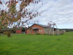 51 Emerald Vale Road Wynyard TAS 7325 Country Pure and Simple Excellent opportunity to purchase some quality land only a a few minutes drive from the centre of Wynyard. The productive block has the Inglis River on the boundary offering the chance to enjoy camping or fishing on the river bank. The quality built 168 sq m brick home (built in 2002) has 3 bed rooms, 2 bath rooms and a good size lounge. The large open plan kitchen/dining/living area is tiled and has timber dados and heated with a Kent freestanding wood heater. A covered sun deck is ideal to enjoy that afternoon drink with great views over the property. A huge rumpus is under the main roof as well as a garage with a roller door. Outbuildings are substantial with a large 180 sq m implement shed plus another big storage shed. Make an inspection time today as this property won’t last as it is listed at Government Valuation and the Vendors are keen for a quick sale. General Features Property Type: Acreage/Semi-Rural Bedrooms: 3 Bathrooms: 2 Building Size: 168.00 m² (18 squares) approx Land Size: 4.35ha (10.75 acres) (approx) Price per acre: $40,000 Indoor Features Living Areas: 2 Outdoor Features Garage Spaces: 2 $430,000