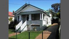 49 Boomerang St Cessnock NSW 2325 Irreplaceable There
wouldn't be many builders around nowadays who could believe a home with
this much class, old-fashioned good looks and quality. And if you do
happen to find one who could it'd be nearly impossible to build this
house for the asking price - before you add in the price of the land in
this excellent location, the cost of the in-ground pool, the
double-sized workshop/garage and carport. Then there's the paved
driveway and landscaping. Take the time out to add up the replacement
cost and it doesn't make sense that you can buy this home at such a
price. This is a beautifully presented splayed weatherboard and
iron period home. It oozes class! There are four double bedrooms, a
formal lounge with natural gas fireplace highlighted by it's
originality, large family/dining room, period kitchen and bathroom,
study and loads of storage space. Make no mistake this is a BIG
home. By my estimate there is over 220sqm of living space (that's
approximately 24 squares). The average modern home is about that size
including a double garage. Externally the property is fully
fenced and landscaped. It has paved walkway and driveway and lush turfed
areas. An enticing in-ground saltwater swimming pool, BBQ area and
gazebo highlight the backyard living space. Though I must admit that my
personal favourite sitting space is the front verandah. If you're looking for a family home to be proud of this is the one!