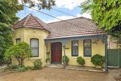 342 New Canterbury Rd Dulwich Hill NSW 2203 Rare opportunity to acquire a magnificent home with loads of character,
appeal, space and comfort. Set back from the street behind a large
established hedge De Rose is a beautiful grand double fronted
freestanding home occupying a prominent position upon a 424sqm level
block in the heart of Dulwich Hill. Enter via a traditional entrance
hallway with breathtakingly high ceilings and ornate original features
inclusive of leadlighting, marble fireplaces, french cedar doors, timber
floorboards, bay windows, and intricate lacework. It is a property that
has been meticulously maintained with an obvious attention to detail
paid to any updates or restoration. The spacious single level layout
includes two generously sized double bedrooms (one with built in
wardrobe and both with ceiling fans) opposite traditional stunning
double formal reception rooms for lounge and dining. The beautifully
appointed new kitchen boasts abundant storage, caesar stone benches,
quality appliances and a skylight feature, leading to a lovely
sunroom/laundry with bay windows encompassing a tranquil leafy outlook
with paved entertainment area. The naturally light-filled main bathroom