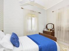 14 Seventh Ave South Townsville QLD 4810 Early 1900's Queenslander Classic!!! Auction Details: Sat 20/12/2014 10:30 AM "Phone for an Inspection". STREET AND 2 LANEWAY ACCESS!!! If there is an Auction you must attend and be an active bidder at this year it will have to be this one. Being held at 10.30am on Saturday 20th December this would be the perfect Christmas present for the family. Structually sound and with the addition of a few modern conveniences you could be in your new home straight away. Built in the early 1900's this home has a lot of history and has seen some changes along the way with the old timber gidgee post having been replaced with concrete and steel stumps. Also the front verandah has been closed in and turned into a sleepout. The original railings and fancy carved fretwork have been preserved and are covered over making it easy to bring back to the original look. (Refer to the black & white photo) There are three bedrooms, combined dining and kitchen, separate lounge plus bathroom upstairs with a separate toilet. Downstairs is lockable with room for one car, plenty of workshop space, laundry and a second toilet.