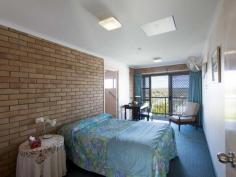 17 CLARENCE STREET Yamba NSW 2464 $1,450,000 Here is a rare opportunity to purchase a 1000 sqm parcel of land perched high on the hill with panoramic views, and the added bonus of a solid building to do what you want with! In its current form, it has twelve ensuited motel style rooms on the top floor. Capturing the expansive views across town and down the Mighty Clarence River with Angourie in the distance! The first floor has massive conference rooms with a break out kitchen area and toilet facilities. Do you run it as a motel or strata title off different parcels or rooms? (STCA) There are so many applications this property lends itself to.Turn this blank canvas into a viable income producing asset!! With the Pacific Highway and bridge construction coming in the near future, permanent/semi permanent rentals will become scarcer by the day!! So get in early as the vendor wants it sold! There is also an area fronting Coldstream Street which has been approved for construction of a four bedroom residence. The property has dual street access and is walking distance to the CBD, Main beach & restaurant precinct! Read more at http://yamba.ljhooker.com.au/4C0FKW#BlQYRoZgoMvwDQRi.99