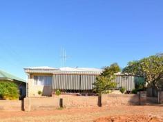 475 Cummins St Broken Hill NSW 2880 EXCELLENT NORTH LOCATION Ideally located to schools and Aquatic Centre this family home is on an elevated site. The home offers three bedrooms with built in robes plus an office. There is a well-appointed stylish kitchen with adjacent dining area which leads through to the lounge room. Centrally located bathroom includes Bath and shower recess, internal laundry and toilet. Low Maintenance grounds with rear vehicle access, garage and carport.
