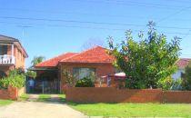 25 Kirrang Ave Villawood NSW 2163 Never before has this home been offered for sale! We are pleased to
present to you this single level original 4 bedroom brick family home.
Ideal for the renovators that would love to renovate to add further
value. Large open plan kitchen, separate dining and lounge room with
timber floors, good size bathroom, external laundry with additional
toilet. Large yard for the kids with BBQ area and covered patio. Single
lock-up garage with additional car port. All this spread over a large
block of 537msq block with endless possibilities to create a self
contained granny flat (S.T.C.A.). Conveniently located only moments away
from transport, schools, shops and much more. Express your interest
now.
Built-In Wardrobes Close to Schools Close to Shops Close to Transport Garden