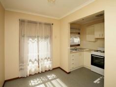 2/96 Crampton Street Wagga Wagga NSW 2650 $250,000 Situated on popular Crampton Street in Central Wagga and within easy distance to the business, shopping and entertainment precincts - this neat and tidy two bedroom unit is a great investment. The property is the second unit in a complex of four - and enjoys no adjoining walls apart from the lock up garage which has remote control and internal access. The living room is well proportioned and enjoys good flow with the added benefit of opening out via a sliding door to the wrap around courtyard. There is a separate dining area which is well located between the kitchen and the lounge room. The kitchen is a compact, light and airy space which is neutrally toned and in good condition. Read more at http://waggawagga.ljhooker.com.au/92DWSGVY#yo6MorsQAPeOeUst.99