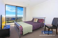 A1803/35 Arncliffe St Wolli Creek NSW 2205 $865,000 A rare opportunity to purchase this modern 2 bedroom apartment on level 18 in Proximity building, spacious floor plan with 180 degree panoramic views of the airport, cooks river and botany bay. Features include 2 bedroom, ensuite, built-ins, open plan kitchen with caesar stone bench tops, gas cooking, dishwasher and stainless steel appliances plus 1 security car space. Complex offers lap pool, sauna and gym. Short walk to new Woolworths super market and train station. Strata approx $1700p/q, council approx $268 p/q and water approx $168p/q. Property: Apartment Bedrooms: 2 Bathrooms: 2 Parking: 1 Council: Rockdale