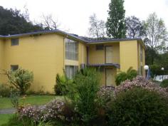 1 Batchelor Street Queenstown Tas 7467 $310,000 Property Information 4 Units for sale in a block of 14 in a prominent position in the mining and tourist town of Queenstown. These units are fully tenanted with leases in place to long term tenants. Each unit is fully furnished and consists of two good sized bedrooms with built-in robes, open plan kitchen and lounge/dining. Bathroom consists of bath with overhead shower and is combined with toilet and laundry facilities. The 14 units are configured into two blocks, one of which is two storey and the other three storey. There is an undercover carport for each unit. The common grounds are managed by a Body Corporate and the units present well. Call Jenelle for inspection or to discuss further. Floor Area 74.5 sqm Property condition Good Property Type Unit Unit style Highrise, Number in block: 14, Number of levels: 3 Garaging / carparking Open carport Construction Brick Joinery Aluminium Roof Iron Walls / Interior Concrete Flooring Tiles and Carpet Window coverings Drapes Heating / Cooling Split cycle a/c, Electric Chattels remaining Heater, washing machine, lounge suite, dining trable and chairs, crockery, cutlery, cooking utensils, bed linen, Blinds, Drapes, Fixed floor coverings, Light fittings, Stove, TV aerial, Curtains Kitchen Original, Open plan, Upright stove and Breakfast bar Living area Open plan Main bedroom Double and Built-in-robe Bedroom 2 Double and Built-in / wardrobe Main bathroom Bath Laundry In bathroom Views Urban Outdoor living Garden Fencing Partial Land contour Flat Grounds Tidy Water heating Electric Water supply Town supply Sewerage Mains Locality Close to schools, Close to shops