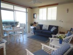 6/1 Queen St Yamba NSW 2464 SPECTACULAR POSITION, PHENOMENAL OCEAN VIEWS This is it, this is the property you’ve been dreaming of, don’t look anywhere else. Where else can you find a position right on the headland, taking in wonderful views of the Pacific Ocean, Main Beach and Convent Beach. Situated on the lower level for easy access, with access to the open grassed lawn area, off your patio, a great spot to relax and soak in the views. Properties in this position aren’t offered for sale every day. Act now to secure this opportunity. Are you looking for a relaxed beach lifestyle, a part-time holiday home or an investment. Yamba is known as Australia’s number 1 holiday destination. Offering beautiful beaches, access to the Clarence River and the lush National Park surrounds, and a charming small-town atmosphere, you could not ask for more in a holiday setting. The well known Craigmore building is beloved to it’s many visitors, and has been a popular holiday spot for many years. The building underwent a renovation in the last few years, with rendering and painting providing a modern façade. The position and of course the views will continue to attract the regular holiday clientele, making this a smart choice for investment. Being sold with the ability to continue holiday letting; this fully equipped unit is decorated in a cool coastal colour scheme. The easy care sand coloured tiled floors throughout the living areas in combination with the blue feature walls and carpeted bedrooms, captures the colours of the seaside environment. This unit offers a lighter and brighter atmosphere than most units, due to its position at the end of the building, and additional windows in the lounge and kitchen. Sliding glass doors from the living room lead to the front patio and beyond to the fenced lawn area. The galley style kitchen is original, however in good condition, with plenty of storage space. Offering two bedrooms, both with built-in robes and ceiling fans, and a combined bathroom and laundry, with shower, vanity, loo, laundry tub, overhead cupboards, washing machine and dryer. Car accommodation is provided with single carport, park the car and walk to the beach, cafes, restaurants, entertainment venues and shops from this location. Property: Unit Bedrooms: 2 Bathrooms: 1 Parking: 1 Rooms: Lounge/Living Local Amenities: Shops Sports Field & Club Park Zoning: SP3 Tourist Council: Lot 6 SP 4356