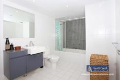 A1803/35 Arncliffe St Wolli Creek NSW 2205 $865,000 A rare opportunity to purchase this modern 2 bedroom apartment on level 18 in Proximity building, spacious floor plan with 180 degree panoramic views of the airport, cooks river and botany bay. Features include 2 bedroom, ensuite, built-ins, open plan kitchen with caesar stone bench tops, gas cooking, dishwasher and stainless steel appliances plus 1 security car space. Complex offers lap pool, sauna and gym. Short walk to new Woolworths super market and train station. Strata approx $1700p/q, council approx $268 p/q and water approx $168p/q. Property: Apartment Bedrooms: 2 Bathrooms: 2 Parking: 1 Council: Rockdale
