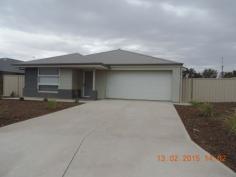46 Clarke Street Wallaroo SA 5556 $340 p.w. Property Information Situated in the peaceful area off Ernest Terrace in Wallaroo in the establishing area adjacent to the hospital and surrounded by other quality new built homes. These newly constructed, modern, stylish homes are just waiting for the perfect tenants to make their own now! On offer to each are 4 bedrooms, main with walk in wardrobe and ensuite, sparkling new kitchen with stainless steel appliances including dishwasher. Separate bathroom & toilet, and overall providing an open plan layout with quality tiled flooring, carpets and elegant fixtures throughout. Reverse cycle air-conditioning for all year round comfort. Landscaped front & rear yards and watering system, fully fenced secure yards allows for easy care and provide sufficient space for the kids to play or entertainers alike. The double garage with roller door has direct access inside, rear patio provide for stylish living. Just a short walk to the town centre, hospital, shopping centre . You would be crazy to overlook these beauties! These properties is a must see; contact us today for further details. Available Date Thursday, 19 February 2015 Property Type House Garaging / carparking Double lock-up, Off street Heating / Cooling Ducted Reverse Cycle Air Conditioning Property features Smoke alarms Kitchen Dishwasher and Gas cooking Living area Open plan, Formal lounge Main bedroom Double, Walk-in-robe and Air Conditioning Ensuite Separate shower Bedroom 2 Double, Built-in / wardrobe and Air Conditioning Bedroom 3 Double, Built-in / wardrobe and Air Conditioning Bedroom 4 Double, Built-in / wardrobe and Air Conditioning Main bathroom Bath, Separate shower, Exhaust fan Laundry Separate Fencing Fully fenced Water supply Town supply, Tank Locality Close to schools, Close to shops Bond $ 2,040
