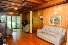 1 Gregory Terrace Kuranda QLD 4881 $575,000 negotiable Emaculate Pole Home in the Rainforest House - Property ID: 772920 This beautifully maintained timber pole home is situated on 1 acre within Kuranda's premiere Top of the Range rainforest estate. Surrounded by lush tropical, landscaped gardens and rainforest trees, this is a very private residence with electric gate entrance. Imagine starting your day with breakfast on the balcony amongst the birds, watching wallabies graze below. Sunset drinks on the front balcony finishes off the day nicely! Timber floors throughout, except the kitchen which has tiles on the floor. There are 4 bedrooms on 3 levels. Upstairs are 2 bedrooms and a bathroom, with a large living area perfect as a kids retreat or TV room. Mum and Dad's main bedroom on the middle level has a great en-suite with rainforest views. The ground level had a bedroom and laundry with a loo, which could easily be converted to a granny flat or makes great accommodation for visiting relatives. There is nothing to do here! Just move right in and enjoy the rainforest lifestyle! Print Brochure Email Alerts Features Land Size Approx. - 4186 m2 Private rainforest block 1 acre Tropical gardens Lots of storage 4 car parks 4 bedrooms Large kitchen
