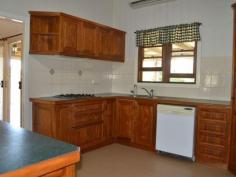 22 Meson Street Gayndah Qld 4625 $275,000 Beautifully Restored Queenslander - Entertainers Delight * 4 good sized bedrooms - 2 with walk in dressing rooms * Returning $285 p/w on a long term lease * Beautiful timber kitchen with ample bench space, dishwasher, gas cooktop + servery * Huge entertaining deck overlooking the back yard * Bathroom features shower over bath & linen cupboard * Polished wooden floors in lounge & front entry room * 3 reverse cycle A/C + ceiling fans * Large 1,363m2 allotment - plenty of room to watch the kids play from the back deck * Centrally located - stone throw away from schools and shops Property Snapshot Property Type: House Land Area: 1,363 m2