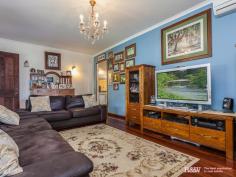2 Ann St Kallangur QLD 4503 DETAILS ID #: 0000246055 Price: $389,000 Type: House Bed: 3 Bath: 1 Land Area: 800 sqm (approx) COLONIAL STYLE ON CENTRAL 800M2 CORNER Highly prized and rarely found attractive home with beautiful timber windows, French doors and hardwood floors. The verandah's are over 10m long on 2 sides and displays the colonial characteristics that are so popular. Here you'll find a separate lounge room and large family size dining. The home has comfortable air conditioning through-out. This galley style kitchen has a smooth 2pac finish with good storage, dishwasher, modern oven, flat cook tops and large fridge space. The bedrooms are a traditional good size with built-ins or cupboards. There's a matching style building beside the house with power and water connected which could be easily used as a 4th guest room/ teenage retreat. The land itself is prime for development application with 29m and 22m (approx) front boundaries. The home is built on stumps making it possible to reposition on the current block or relocate onto other land. Rarely found beautifully presented comfortable property to live in, with convenience to everything, and real options to secure your future.