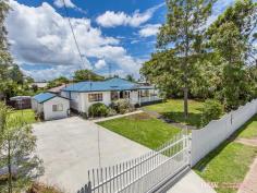 2 Ann St Kallangur QLD 4503 DETAILS ID #: 0000246055 Price: $389,000 Type: House Bed: 3 Bath: 1 Land Area: 800 sqm (approx) COLONIAL STYLE ON CENTRAL 800M2 CORNER Highly prized and rarely found attractive home with beautiful timber windows, French doors and hardwood floors. The verandah's are over 10m long on 2 sides and displays the colonial characteristics that are so popular. Here you'll find a separate lounge room and large family size dining. The home has comfortable air conditioning through-out. This galley style kitchen has a smooth 2pac finish with good storage, dishwasher, modern oven, flat cook tops and large fridge space. The bedrooms are a traditional good size with built-ins or cupboards. There's a matching style building beside the house with power and water connected which could be easily used as a 4th guest room/ teenage retreat. The land itself is prime for development application with 29m and 22m (approx) front boundaries. The home is built on stumps making it possible to reposition on the current block or relocate onto other land. Rarely found beautifully presented comfortable property to live in, with convenience to everything, and real options to secure your future.