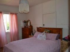 14 Porter Street Gayndah Qld 4625 $209,000 Not Just a Pretty Face * Solid 3 bedroom home on a spacious 1679m2 - * Returning $250 p/w partly furnished * Freshly painted kitchen with gas stove & pantry - lots of cupboard space * Two bathrooms * Cladded Exterior * New curved driveway with feature garden * 1 bay lock up garage, 6x6 shed, 3x3 lawn locker + carport * New rev cycle A/C in living area + plenty of windows to let the breeze in * Rain water tanks * Established trees and gardens * Option to buy fully furnished Property Snapshot Property Type: House Land Area: 1,679 m2