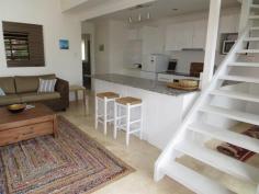 1/11-13 The Crescent - Angourie NSW 2464 $369,000 LIVE THE DREAM IN ANGOURIE Have you always dreamt of a carefree lifestyle near the ocean, well here is your chance to make it a reality without breaking the bank. Enjoy morning strolls along Spooky beach then grab some breakfast at the Angourie store, both within a few minutes walk from your front door. This unit has been completely renovated inside out so there’s nothing to do but move in and relax. Open plan lounge/dining with contemporary all white two pac kitchen which leads onto a large north facing timber deck. The deck enjoys ocean glimpse plus is ideal for entertaining or catching an ocean breeze. There is main bedroom downstairs plus second loft bedroom upstairs both serviced by an ultra modern stylish bathroom. This unit also offers laundry facilities within plus single carport. Ideal for astute investor or embrace all Angourie has to offer with this modern 2 bedroom unit. Property: Unit Bedrooms: 2 Bathrooms: 1 Parking: 1 Council: Lot 4 SP 67003