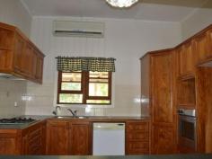22 Meson Street Gayndah Qld 4625 $275,000 Beautifully Restored Queenslander - Entertainers Delight * 4 good sized bedrooms - 2 with walk in dressing rooms * Returning $285 p/w on a long term lease * Beautiful timber kitchen with ample bench space, dishwasher, gas cooktop + servery * Huge entertaining deck overlooking the back yard * Bathroom features shower over bath & linen cupboard * Polished wooden floors in lounge & front entry room * 3 reverse cycle A/C + ceiling fans * Large 1,363m2 allotment - plenty of room to watch the kids play from the back deck * Centrally located - stone throw away from schools and shops Property Snapshot Property Type: House Land Area: 1,363 m2