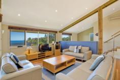 22/57 Andy Poole Drive Tathra NSW 2550 FOR SALE $649,000 L3713. Architect designed & award winning executive style beach Villa. Imagine waking up to the sounds of the gentle waves crashing & effortlessly step from your Villa to the beach & cafés. Entertain your family & friends in style--boasting generous open plan living areas, ocean views, quality finishes, 4 bedrooms (main with ensuite) & a private entertaining deck. Designed to take advantage of the winter sun / summer breezes & set amongst beautiful resort styled landscaping, 3 swimming pools / spa pool plus a conference function room. Premium holiday Villa offering astute management, good returns & stress free holidays... PROPERTY DETAILS Property Id: 61343350 Available: October 15, 2013