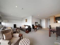 205/175 Kangaroo Road Hughesdale Vic 3166 PROPERTY DETAILS $557,500 Stretch Out with the City in Sight! Investors you now have the opportunity to add this impressive apartment to your portfolio. We are currently preparing Lease documentation for a negotiated 12 month tenancy $450 per week commencing as soon as owners vacate. Watch the sun set, see the sparkle of the city lights, stretch out in style on the edge of the transport, retail and restaurant precinct! Reaching out to afternoon sun and city skyline views with an angular balcony, this super-sized two bedroom, two bathroom apartment goes above and beyond with super-sized living wrapping around to provide room for a home-office, a bathroom for each bedroom and a vast master bedroom with dedicated mirror-robed dressing area. Optioned up with a slick stone and Blanco kitchen and frameless screened designer bathrooms, this elite apartment has the comfort of reverse-cycle air-conditioning, the peace of mind of video-intercom entry and the ease of lift-access to two basement carspaces and storage. A stroll to Oakleigh's cafes and restaurants, a dash to the station and minutes to Chadstone's retail therapy, this is sizeable apartment opportunity with a view to the future!