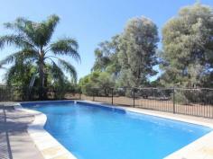 23 Edgewood Drive Emerald Qld 4720 $609,000 Get Ready For Summer Spread out on acreage, loctaed at 'Edgewood Estate' this two storey family home offers plenty of wide open spaces for the whole family to enjoy. Features Upstairs: * 3 Bedrooms * Well set out kitchen with heaps of cupboard space * Separate lounge and dining areas * Split system air conditioning to lounge room along with evap cooling * Polished floor boards * Recently renovated main bathroom * Wrap around verandah to 3 sides Downstairs * 2 extra arge rooms * Bathroom * Kitchen * Separate lounge/rumpus room Outside * 9m x 6m shed with additional 3m x 3m & 2m x 3m awnings to front and side * In-ground swimming pool * Kids playground with flying fox * Fully fenced Call Brenda from LJ Hooker for an appointment to view this exceptional home. Property Snapshot Property Type: acreage Construction: Hardiplank Zoning: VACANT URBAN LAND Land Area: 4,116 m2 Features: Ensuite